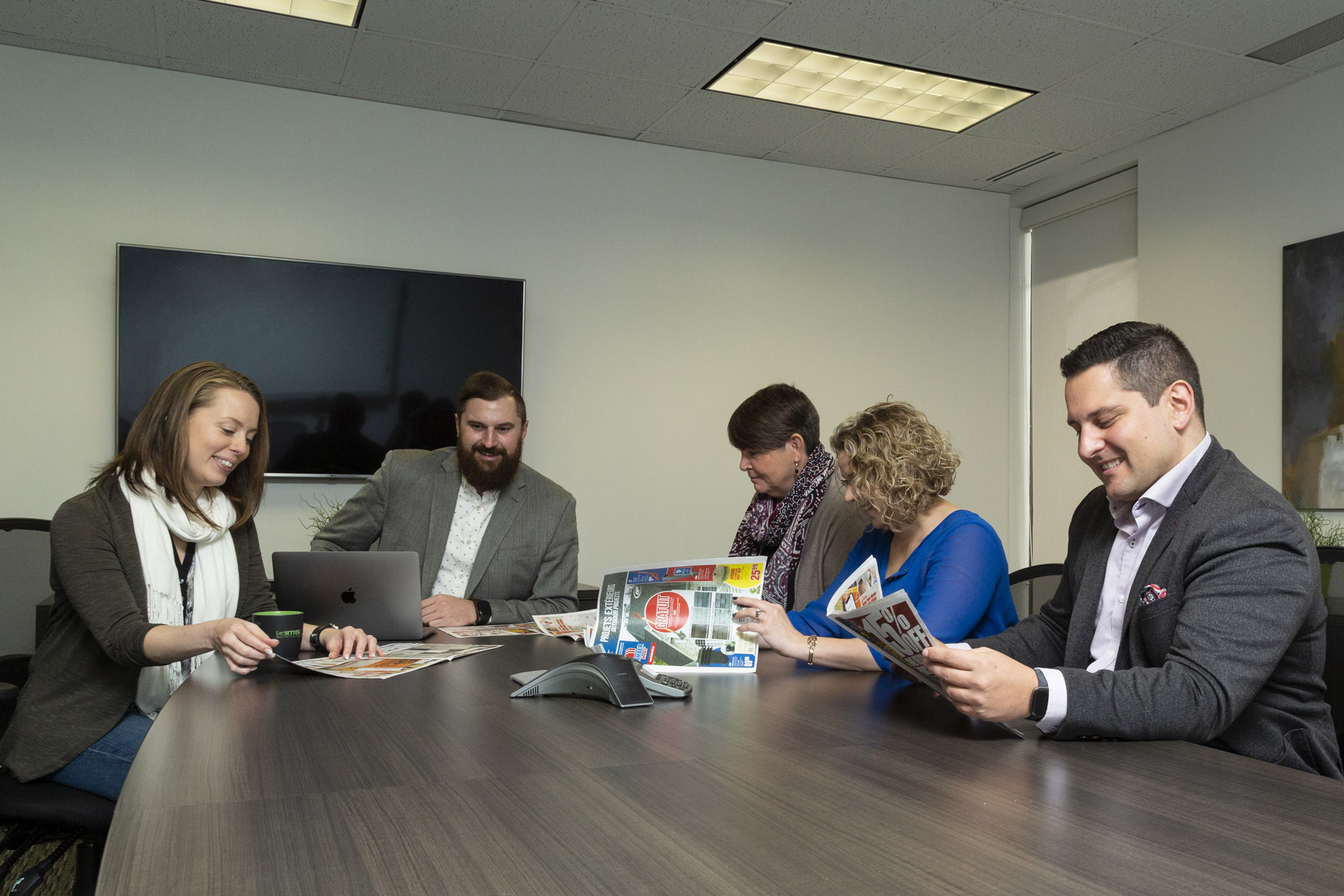 Staff discussing strategy in our boardroom Staff discussing strategy in our boardroom
